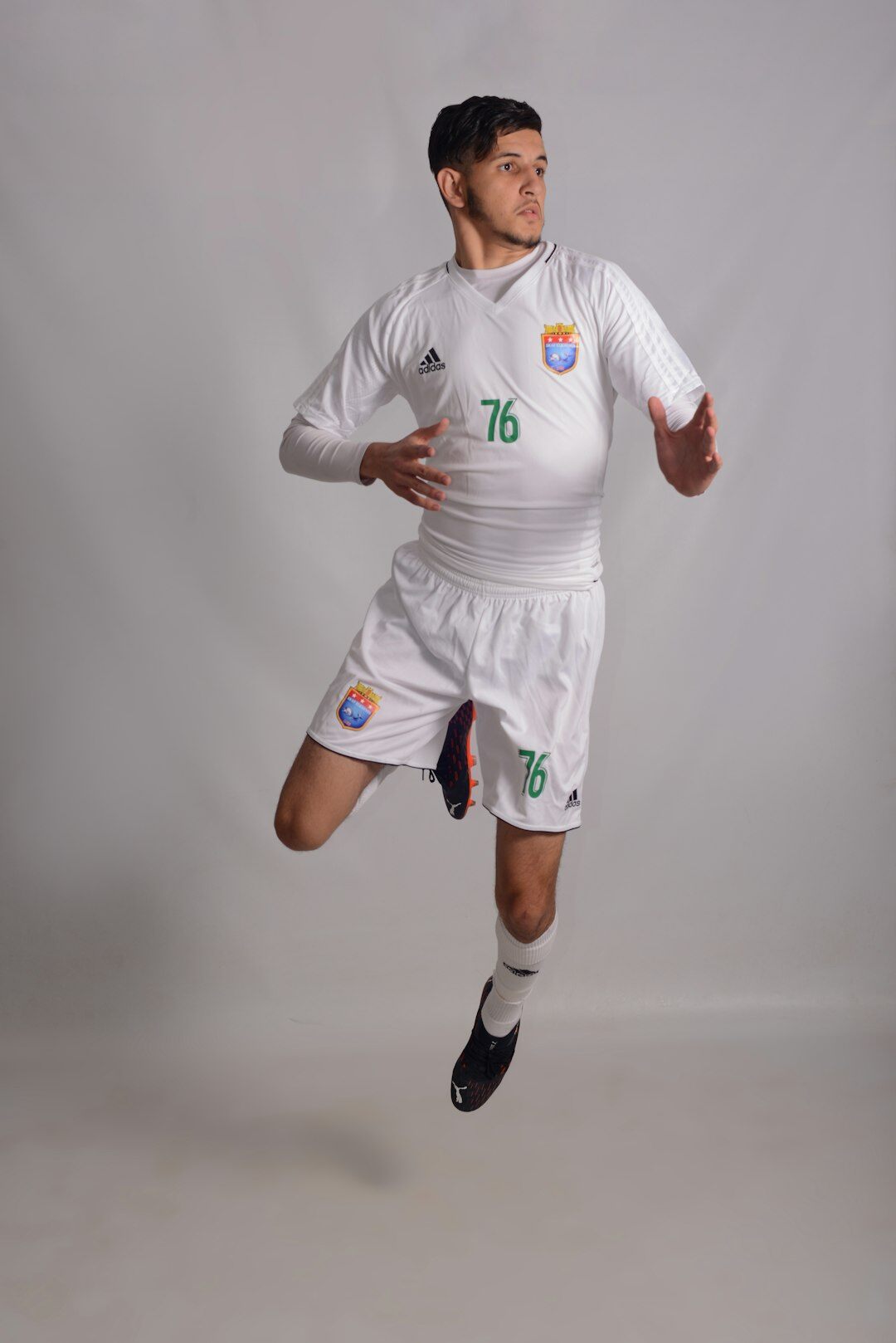 Uruguayan football star smiling in a stadium tunnel